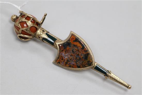 A Victorian Scottish gold and hardstone set sword and shield brooch, 10.1cm.